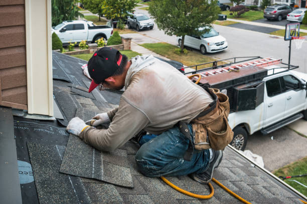 Professional Roofing technician working in Hayfield, MN